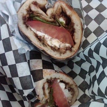Hungry Nomad Truck - Za'atar Feta Wrap $5.49 (Mediterranean thyme, sesame seeds, oil, with mint, tomato & French feta cheese) - Street Vendors Near Me Hungry Nomad Truck - Za'atar Feta Wrap $5.49 (Mediterranean thyme, sesame seeds, oil, with mint, tomato & French feta cheese) - Street Vendors Near Me