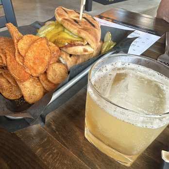 Rapid River Stillhouse - Cuban sandwich house chips and Southern sunshine cocktail - American Near Me - Grand Rapids, Michigan Rapid River Stillhouse - Cuban sandwich house chips and Southern sunshine cocktail - American Near Me - Grand Rapids, Michigan