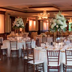 The Mansion at Oyster Bay - Step into our ballroom, where lavish decor and sparkling chandeliers create an enchanting ambiance.