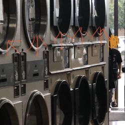Shelby's Coin Laundry - Notice the 5 broken machines in a row and the rigged washer with ??