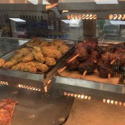 "Rachel" says every one of the pieces of chicken is $1.49. See the meatballs next to them. That is how they normally are in groups of 5.