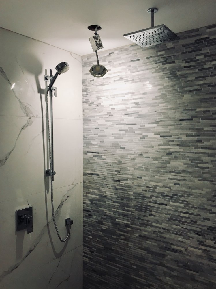 Final Plumbing Installation Of Shower Fixtures By Atre Drain And