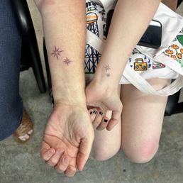 Matching mother/daughter tattoos before my girl heads off to college. Matching mother/daughter tattoos before my girl heads off to college.