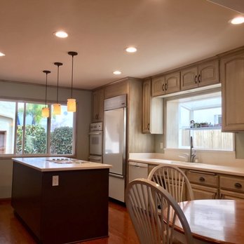 Marcelino Art - After the transformation with high end cabinet finish that ties in with rest of the house - Painters Near Me