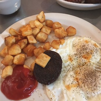 Rathskeller Bistro - Eggs, sausage, toast, and potatoes - New American Near Me - Fredericksburg, Texas