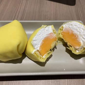 Honeymoon Dessert - Mango pillow: nothing special. Just a piece of mango with whipped cream in a crepe. Not worth the wait. - Desserts Near Me - Markham, Ontario Honeymoon Dessert - Mango pillow: nothing special. Just a piece of mango with whipped cream in a crepe. Not worth the wait. - Desserts Near Me - Markham, Ontario