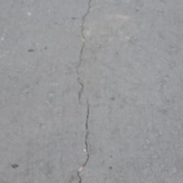 Cracks after a couple months of new asphalt. Cracks after a couple months of new asphalt.