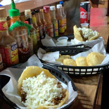 Los Chamos Arepas - Shredded meat and cheese arepas and mixed empanadas to share equal the perfect meal. The hot sauce selection is a total plus. - Venezuelan Near Me - Carolina, Puerto Rico