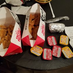 KFC - My order as I got it, had to ask for 2 additional sauces. Plus the little aluminum foil pack is their "ear" of corn, I ordered 2 but got 1