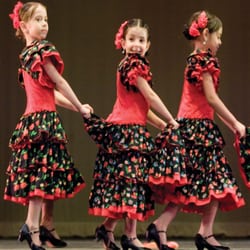 American Bolero Dance Company - Students of American Bolero Dance Company Spanish Dance School taking bows after their Spring Recital. Photo by Dimas Motta.