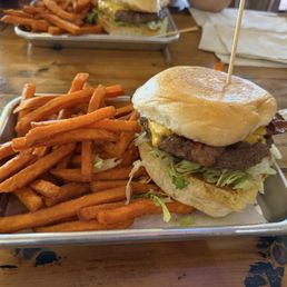 Bacon cheeseburger with sweet potato fries.