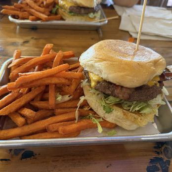 The Shack - Bacon cheeseburger with sweet potato fries. - Burgers Near Me - San Antonio, Texas