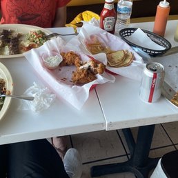 Party of two buffet.  Chicken wings , fire  Lamb shank on point.  French fries what ! Koobida, soso.  Come and get it. Wont disappoint