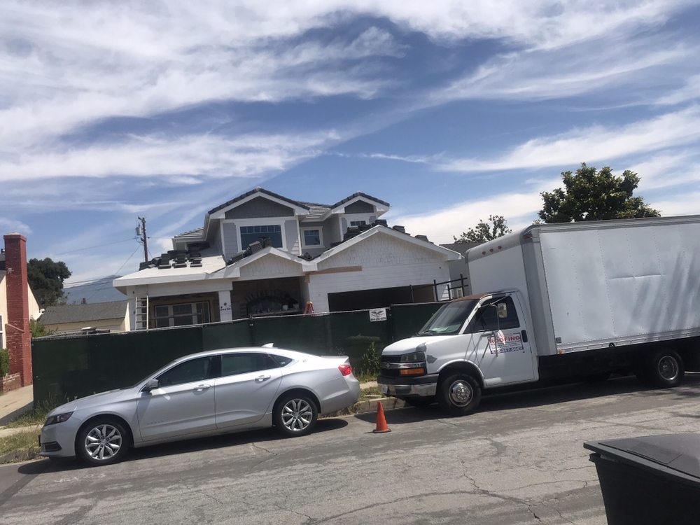 Slide of MA Roofing and Gutters