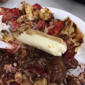 Crepes Cafe - This is the fraction of a slice of cheese cake the chef gave me after i continued to complain. - Creperies Near Me - Miami, Florida