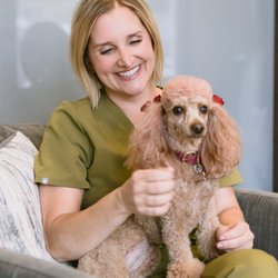Asheville Periodontics - Dr. Goggin and our practice mascot, Rosebud!