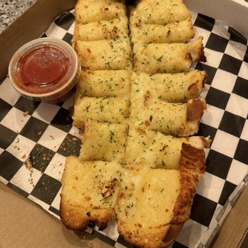 Famous Brick Oven Pizzeria - Cheesy garlic bread - Pizza Near Me - Beech Mountain, North Carolina Famous Brick Oven Pizzeria - Cheesy garlic bread - Pizza Near Me - Beech Mountain, North Carolina