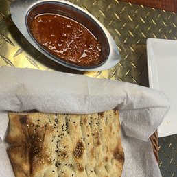 Muhammara (Roasted Red Pepper Dip) Delicious bread both complimentary Muhammara (Roasted Red Pepper Dip) Delicious bread both complimentary