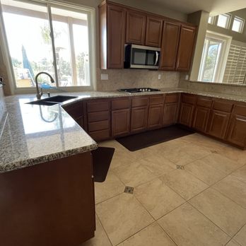 Home Masters Intl - Kitchen Before - we removed the center island and extended the length of the kitchen - General Contractors Near Me - Rancho Cucamonga, California