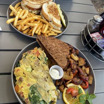 Honey's Bistro - Artichoke Chicken Sausage Omelette Artichoke Chicken Sausage Omelette and Tuna Melt - Breakfast & Brunch Near Me - Encinitas, California