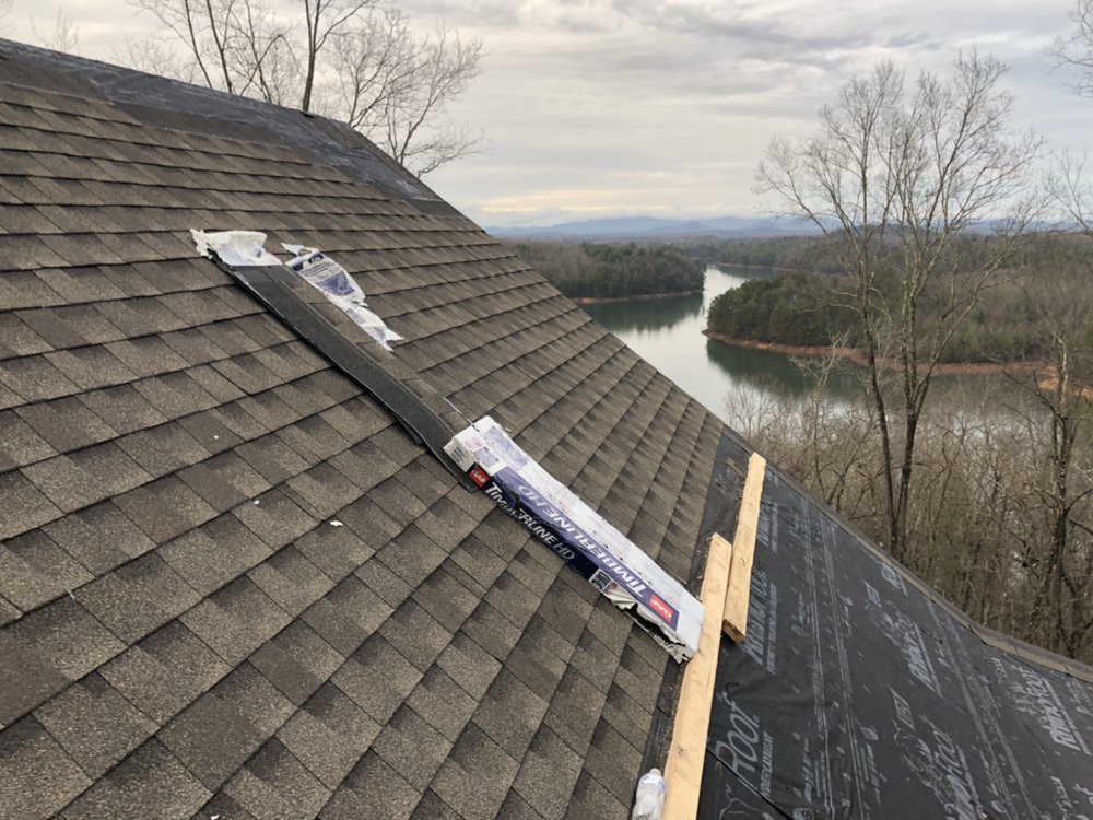 Slide of Sutton Roofing & Construction Company