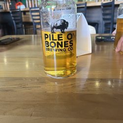 Pile O' Bones Brewing - A pint of long lake lager