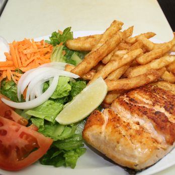 Riki Tiki Bar - Grilled Salmon Entree - Dive Bars Near Me - Miami Beach, Florida Riki Tiki Bar - Grilled Salmon Entree - Dive Bars Near Me - Miami Beach, Florida