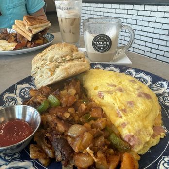 Taylor Sam's - Omelette, potatoes and jalapeño biscuit - Breakfast & Brunch Near Me - St. Petersburg, Florida