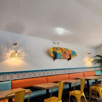 El Pollo Guapo - a surfboard on the wall - Chicken Shop Near Me - James Island, South Carolina El Pollo Guapo - a surfboard on the wall - Chicken Shop Near Me - James Island, South Carolina