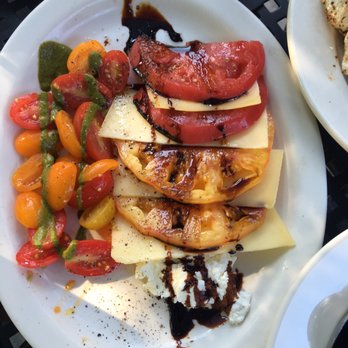 Warren's Spirited Kitchen - The best damn tomato salad you'll ever have. - New American Near Me - Burton, Ohio Warren's Spirited Kitchen - The best damn tomato salad you'll ever have. - New American Near Me - Burton, Ohio