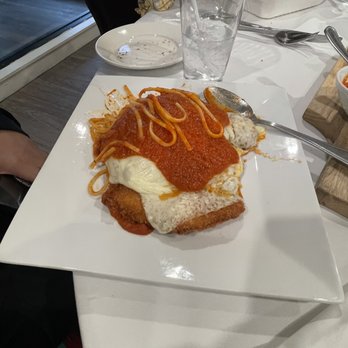 Carlucci's Waterfront - Chicken Parmigiana over linguine - Seafood Near Me - Mount Laurel, New Jersey Carlucci's Waterfront - Chicken Parmigiana over linguine - Seafood Near Me - Mount Laurel, New Jersey
