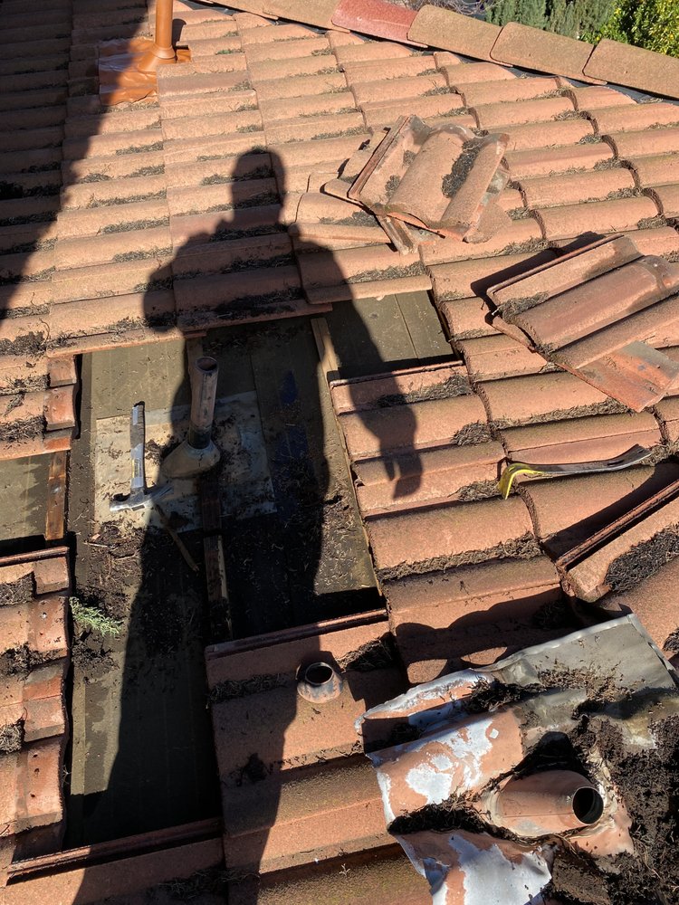 Slide of New Roof Repair Gutters