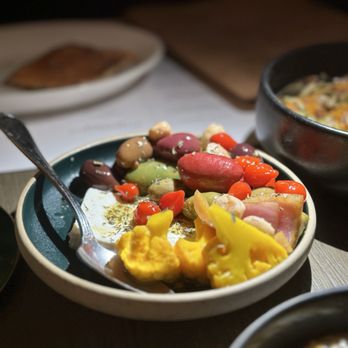 Aba Miami - Bal Harbour - Marinated Olives & Feta (pickled cauliflower & onion, sweet drop pepper, marcona almond, orange zest), $16 - Mediterranean Near Me - Bal Harbour, Florida