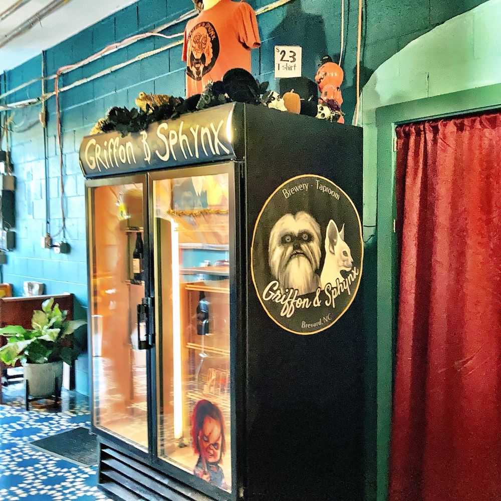 Griffon & Sphinx - Cooler with bottles of their brews for to-go purchase. - Breweries Near Me - Brevard, North Carolina Griffon & Sphinx - Cooler with bottles of their brews for to-go purchase. - Breweries Near Me - Brevard, North Carolina
