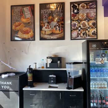 Cinnaholic - Photos of cinnamon roll options. Cold drinks and station of fixins for hot drinks. - Bakeries Near Me - Arlington, Texas