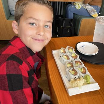 Bluefin Sushi Bar & Ramen - Jay Jay and his first Salmon Avocado Roll - Sushi Bars Near Me - Sunset Valley, Texas Bluefin Sushi Bar & Ramen - Jay Jay and his first Salmon Avocado Roll - Sushi Bars Near Me - Sunset Valley, Texas