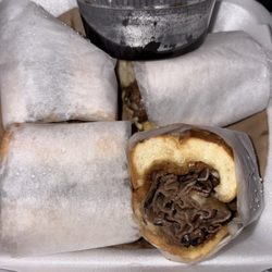 Metro Deli - French Dip sandwich : we requested he cut our sandwiches into fours. provolone cheese with warm seasoned perfect au jus for dipping.