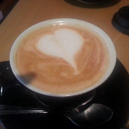 Delicious almond Capuccino in the heart of quartier Latin, Montreal Canada