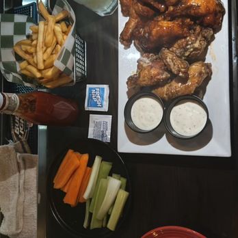 The Red Lion - Garlic Parm, sweet chili, and buffalo wings - Pubs Near Me - New York, New York The Red Lion - Garlic Parm, sweet chili, and buffalo wings - Pubs Near Me - New York, New York