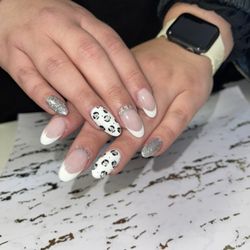 Nails Recreated - Another fun acrylic set with cute French and leopard print design. Finished with some simple gems.