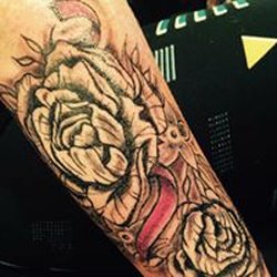 Ink and Ashes Tatoo and Art Studio