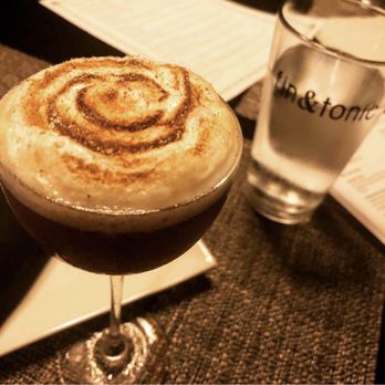 Fin & Tonic - Photo Cred: @bigboldeatsvirginia on Instagram: Speciality chocolate cocktail only on menu for limited time in the speak easy - New American Near Me - Suffolk, Virginia Fin & Tonic - Photo Cred: @bigboldeatsvirginia on Instagram: Speciality chocolate cocktail only on menu for limited time in the speak easy - New American Near Me - Suffolk, Virginia