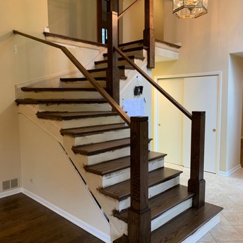 Rhema Construct - stained and finished stair treads, posts, and hand rails - Flooring Near Me
