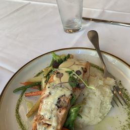 Salmon, seasonal veggies, mashed potatoes, sauce with too many peppercorns Salmon, seasonal veggies, mashed potatoes, sauce with too many peppercorns