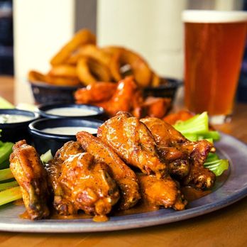 Uptown Sports Bar - We only serve Jumbo Wings served in our made from scratch sauces - Sports Bars Near Me - Albuquerque, New Mexico Uptown Sports Bar - We only serve Jumbo Wings served in our made from scratch sauces - Sports Bars Near Me - Albuquerque, New Mexico