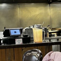 Ninja Hibachi & Burger - Open container of sauce by register