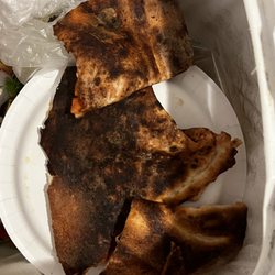 This is all the crust. We ate the cheese and toppings that slid off with a fork and threw the rest away. Very sad.