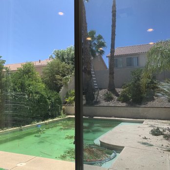 FilmProLV - Old bronze tint on the right, removed and clean on the left, nasty ass pool in the back - Home Window Tinting Near Me - Las Vegas, Nevada