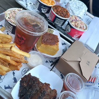 Pig Beach BBQ - 1/2 lb Brisket, French Fries, Cornbread, Hot Honey Dry Rub Wings on my plate! - Barbeque Near Me - Astoria, New York Pig Beach BBQ - 1/2 lb Brisket, French Fries, Cornbread, Hot Honey Dry Rub Wings on my plate! - Barbeque Near Me - Astoria, New York