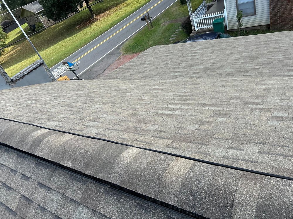 Slide of Dos Amigos Roofing